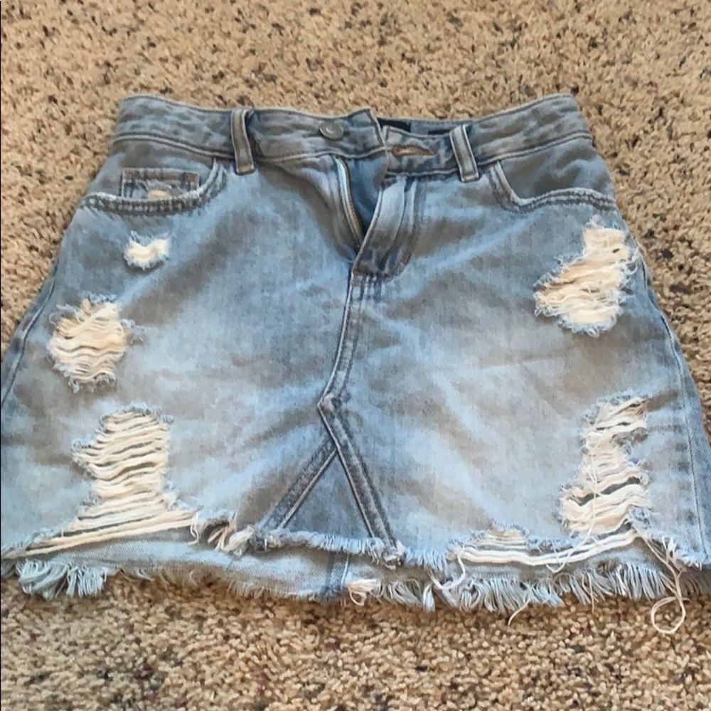 Light wash, ripped, high-rise Jean skirt